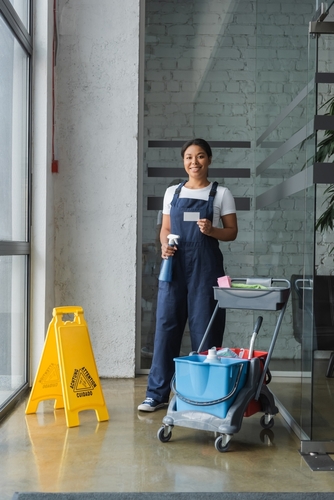 Happy,Bi-racial,Woman,Holding,Detergent,And,Empty,Business,Card,Neat